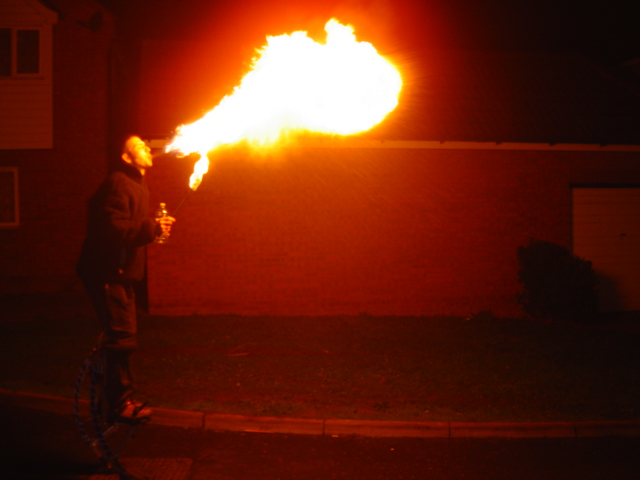 Dragon's Fire blow on stilts